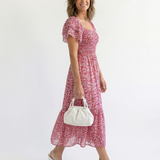 Constança - Vestido Midi com Ombros à Mostra e Estampa de Flores
