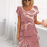 Rita – Vestido elegante fluido com volantes