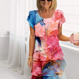 Marta – Vestido elegante fluido com volantes