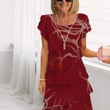 Leonor – Vestido elegante fluido com volantes