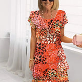 Catarina – Vestido elegante fluido com volantes