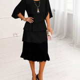 Joana – Vestido elegante fluido com volantes